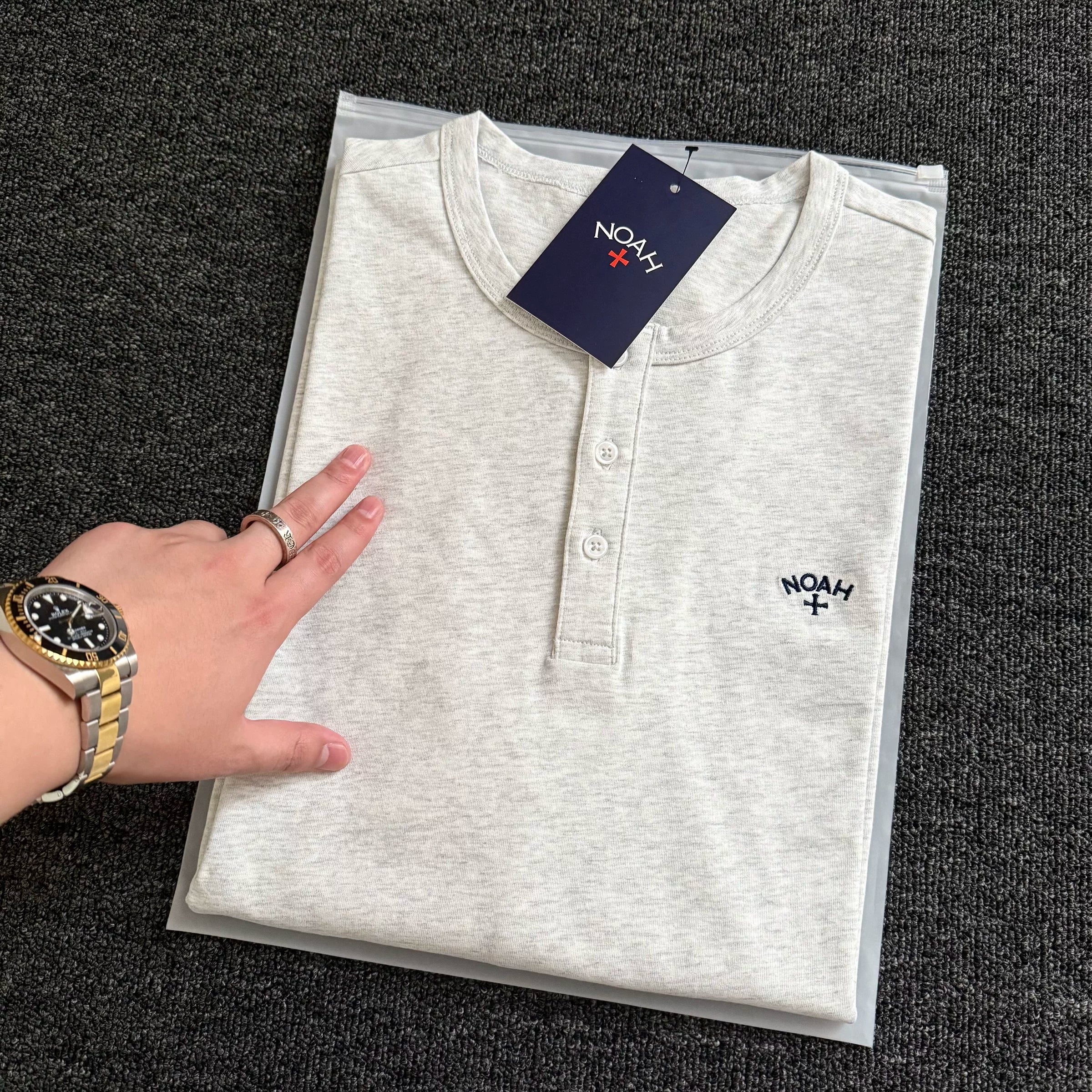 NOAH MARS American casual embroidery small logo cross, new and old money style versatile Henry collar long sleeved T-shirt for men